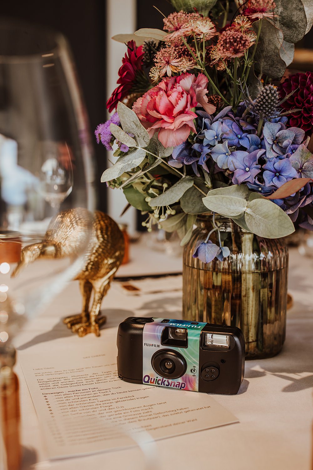 Fernblick Wedding Sandy Alonso Photography Centrepiece Flowers Instant Camera Pink Blue