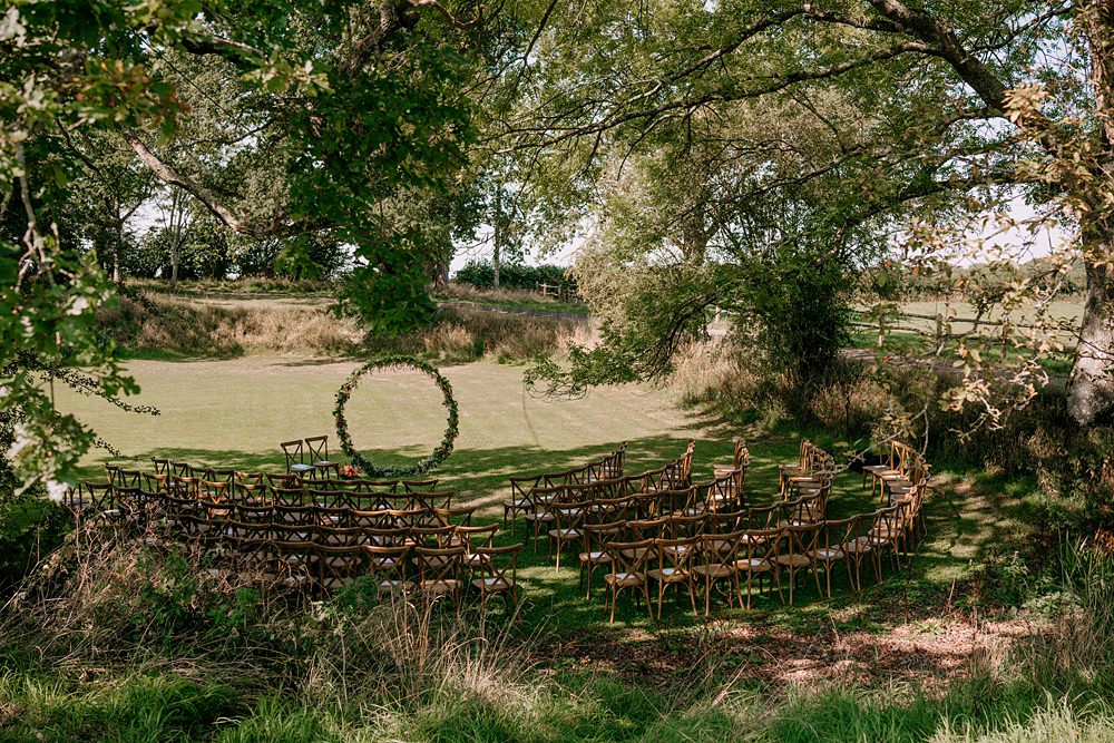 Haylands Barn Wedding Phoebe Rossi Photography Outdoor Ceremony Hoop Flower Backdrop