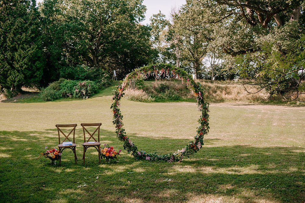 Haylands Barn Wedding Phoebe Rossi Photography Outdoor Ceremony Hoop Flower Backdrop