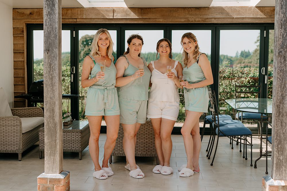 Haylands Barn Wedding Phoebe Rossi Photography Bride Bridesmaids PJs Shorts