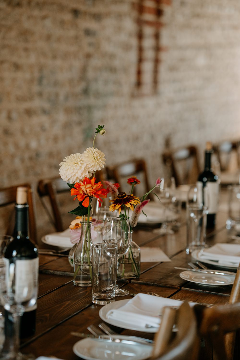 Haylands Barn Wedding Phoebe Rossi Photography Bottle Flowers Centrepiece Simple