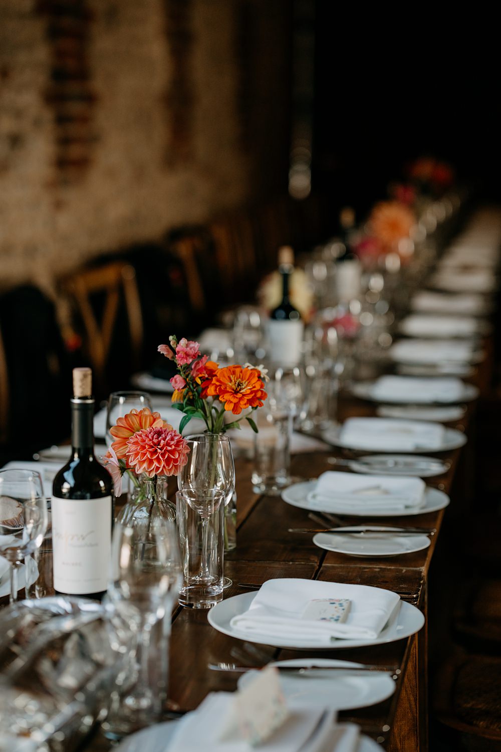 Haylands Barn Wedding Phoebe Rossi Photography Bottle Flowers Centrepiece Simple