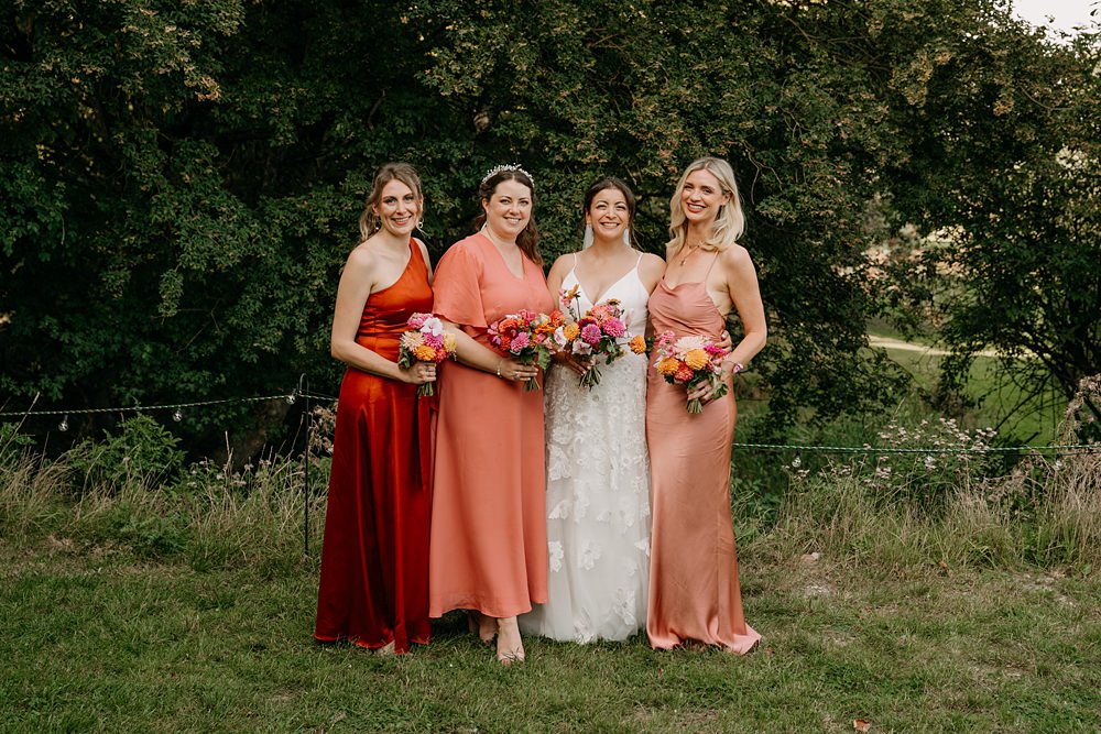 Haylands Barn Wedding Phoebe Rossi Photography Mismatched Pink Red Bridesmaid Dresses