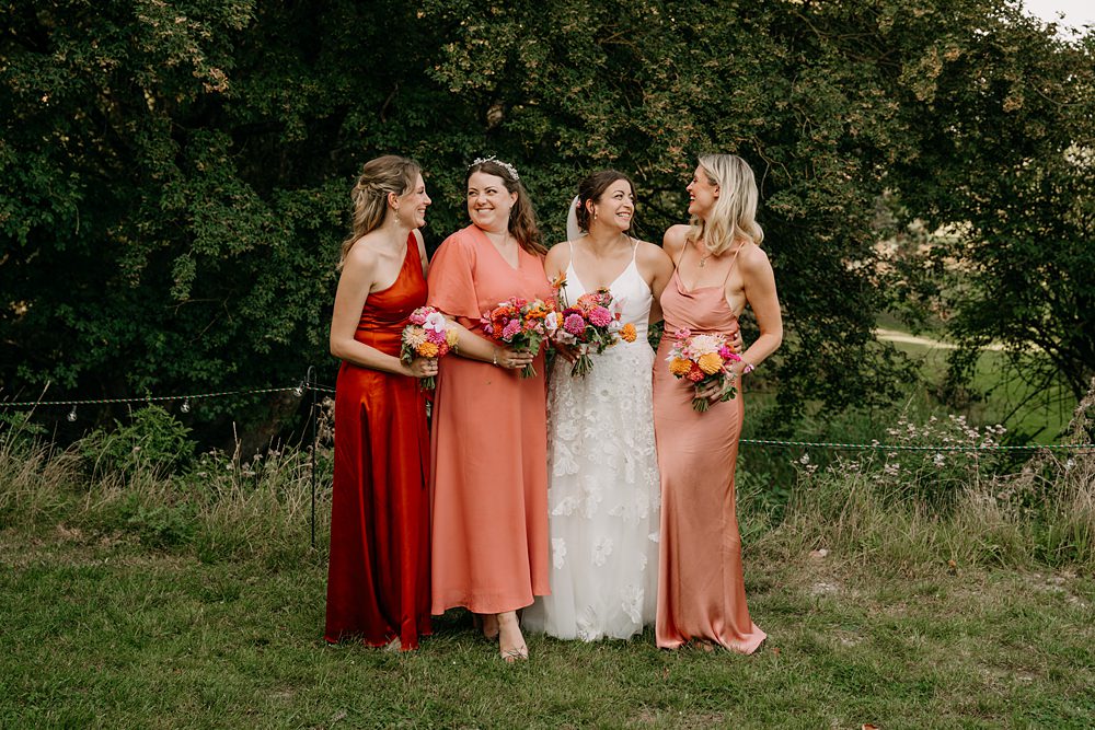 Haylands Barn Wedding Phoebe Rossi Photography Mismatched Pink Red Bridesmaid Dresses
