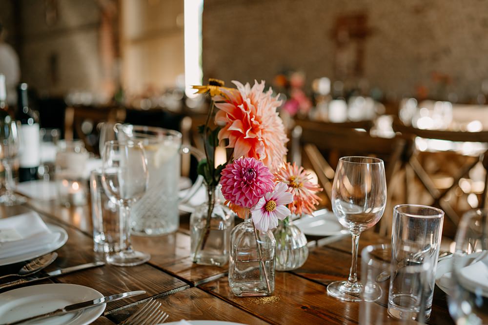 Haylands Barn Wedding Phoebe Rossi Photography Bottle Flowers Centrepiece Simple