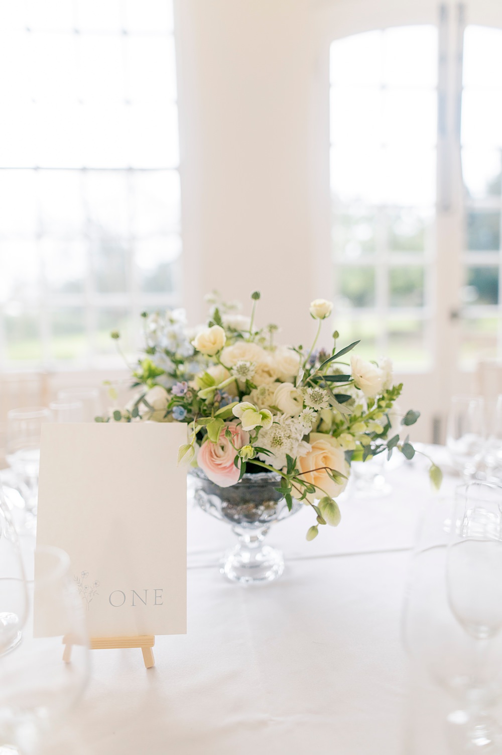Peach Fuzz Sage Green Wedding Ideas Centrepiece Flower Arrangement Spring Glass Urn Charlotte Sams