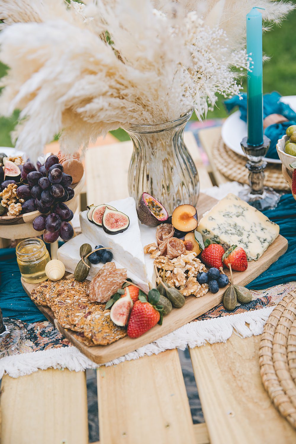 Boho Western Wedding Ideas Red Peacock Photography Grazing Table Centrepiece Food Pampas Grass Blue Runner