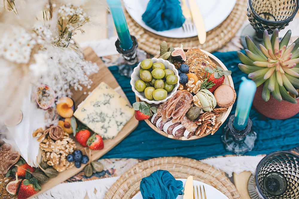 Boho Western Wedding Ideas Red Peacock Photography Grazing Table Centrepiece Food Pampas Grass Blue Runner