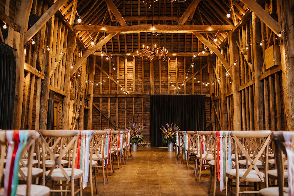Colourful Hertfordshire Barn Wedding Binky Nixon Photography Festoon Lights Ceremony Decor