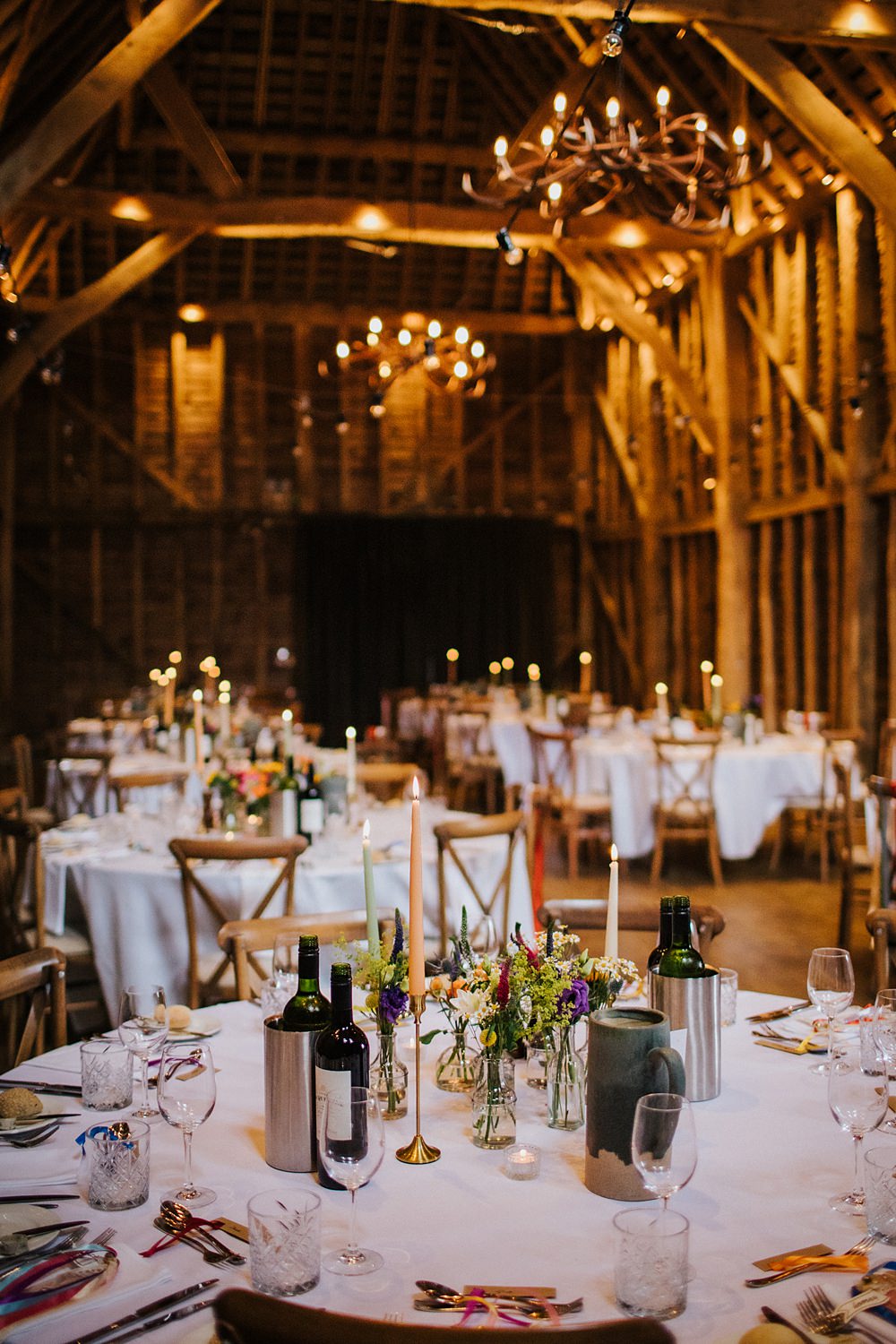 Colourful Hertfordshire Barn Wedding Binky Nixon Photography Festoon Lights Round Tables Decor