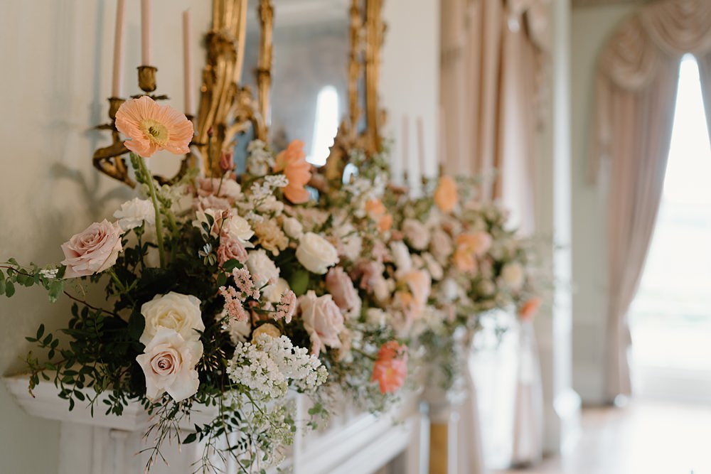 Luxury Elegant Wedding Ideas Gina Fernandes Photography Mantle Fireplace Flowers Peach Cream