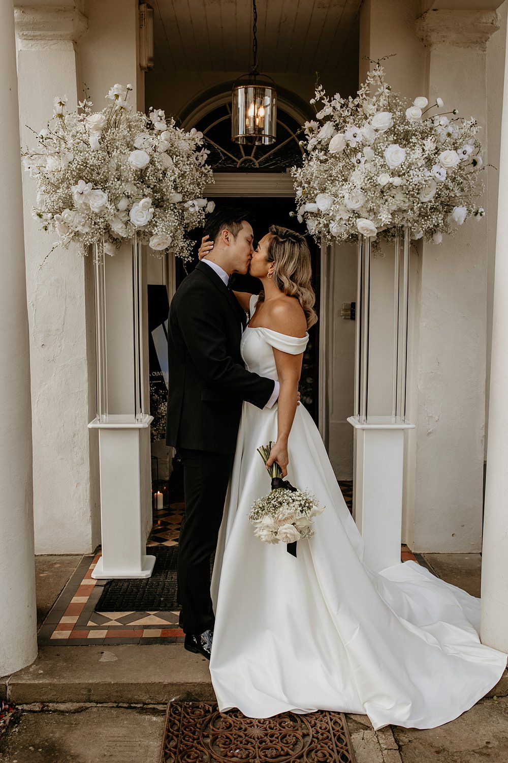 Black Bow Wedding Ideas Ginger Jam Photography White Flower Pillars Decor Doorway