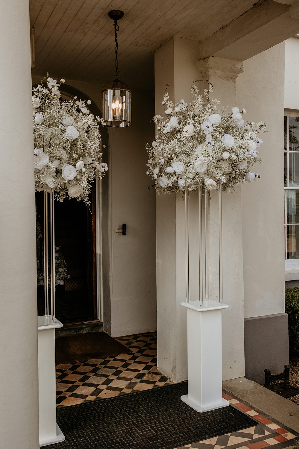 Black Bow Wedding Ideas Ginger Jam Photography White Flower Pillars Decor Doorway