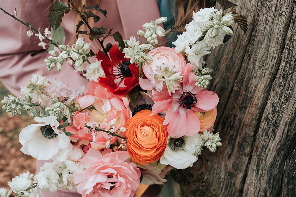 Cottagecore Wedding Ideas Melanie Barnfield Photography Groom Bouquet Flowers Colourful Spring Pastel