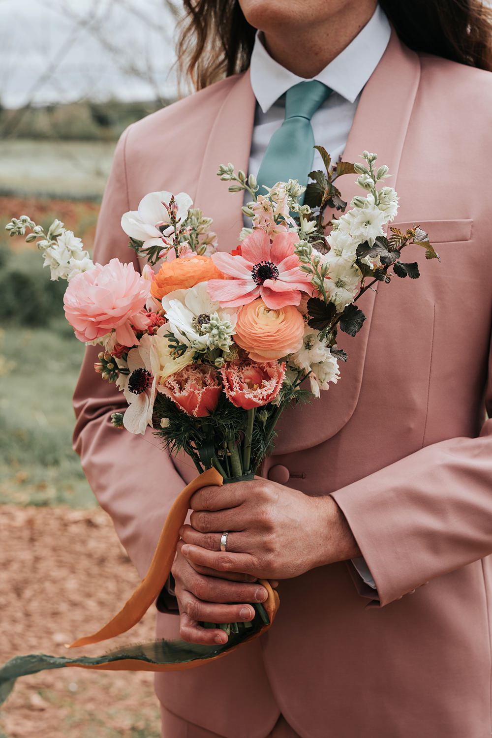 Cottagecore Wedding Ideas Melanie Barnfield Photography Groom Bouquet Flowers Colourful Spring Pastel