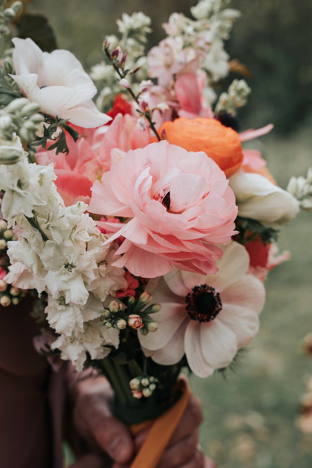 Cottagecore Wedding Ideas Melanie Barnfield Photography Groom Bouquet Flowers Colourful Spring Pastel
