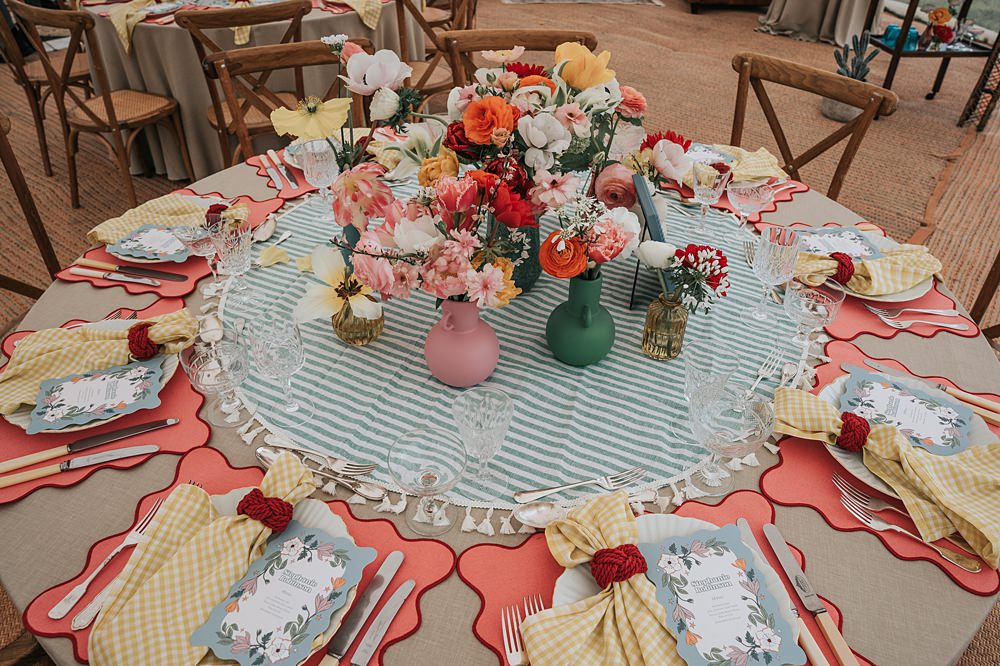 Cottagecore Wedding Ideas Melanie Barnfield Photography Centrepiece Flowers Colourful Gingham Table Cloth Decor