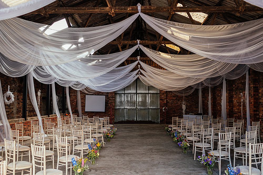 Fife Farm Wedding Joy Story Photo Barn Drapes Decor Ceremony Flowers