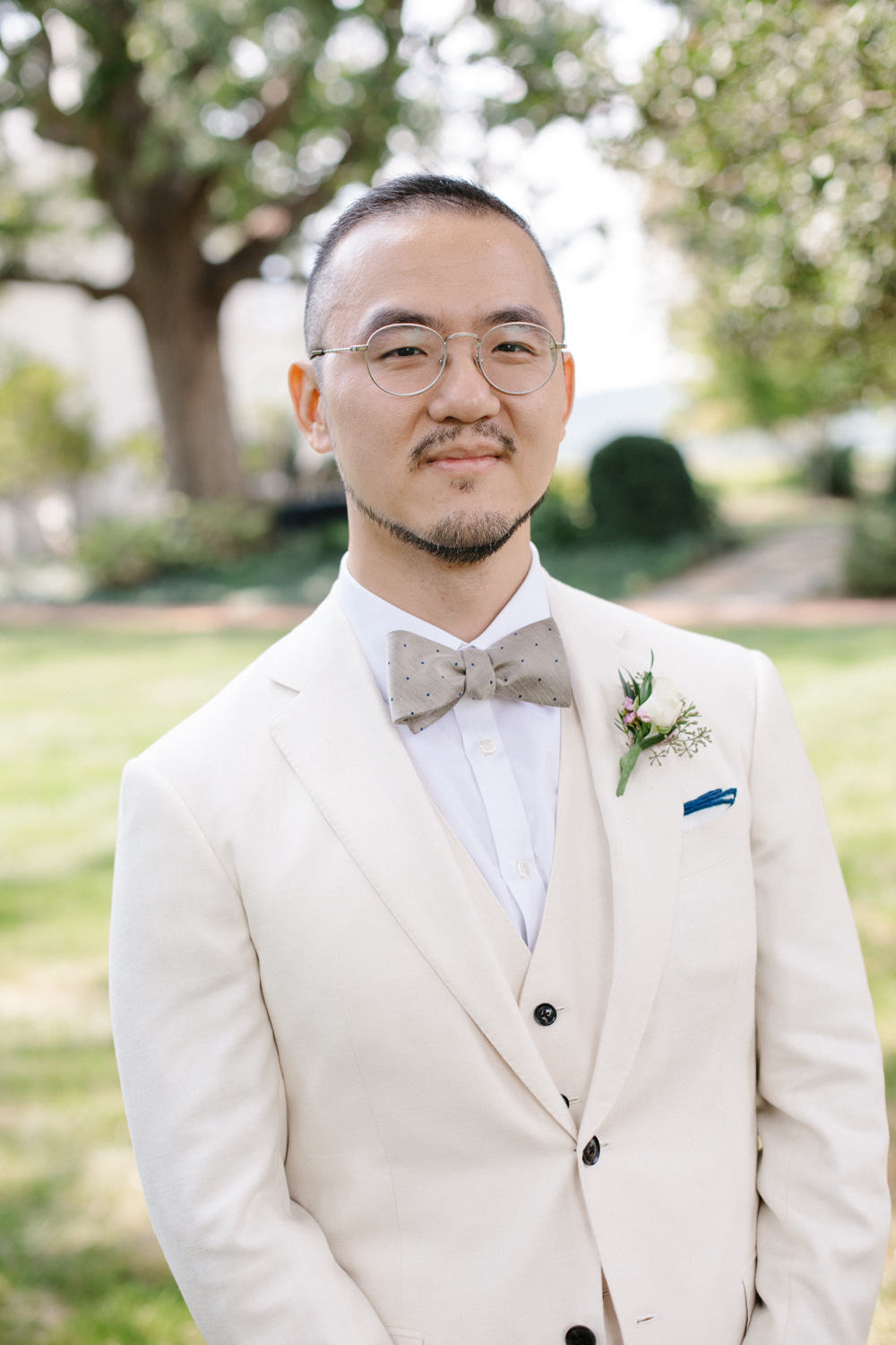 Keswick Vineyards Wedding The Smiths Photography Groom Cream Suit Bow Tie