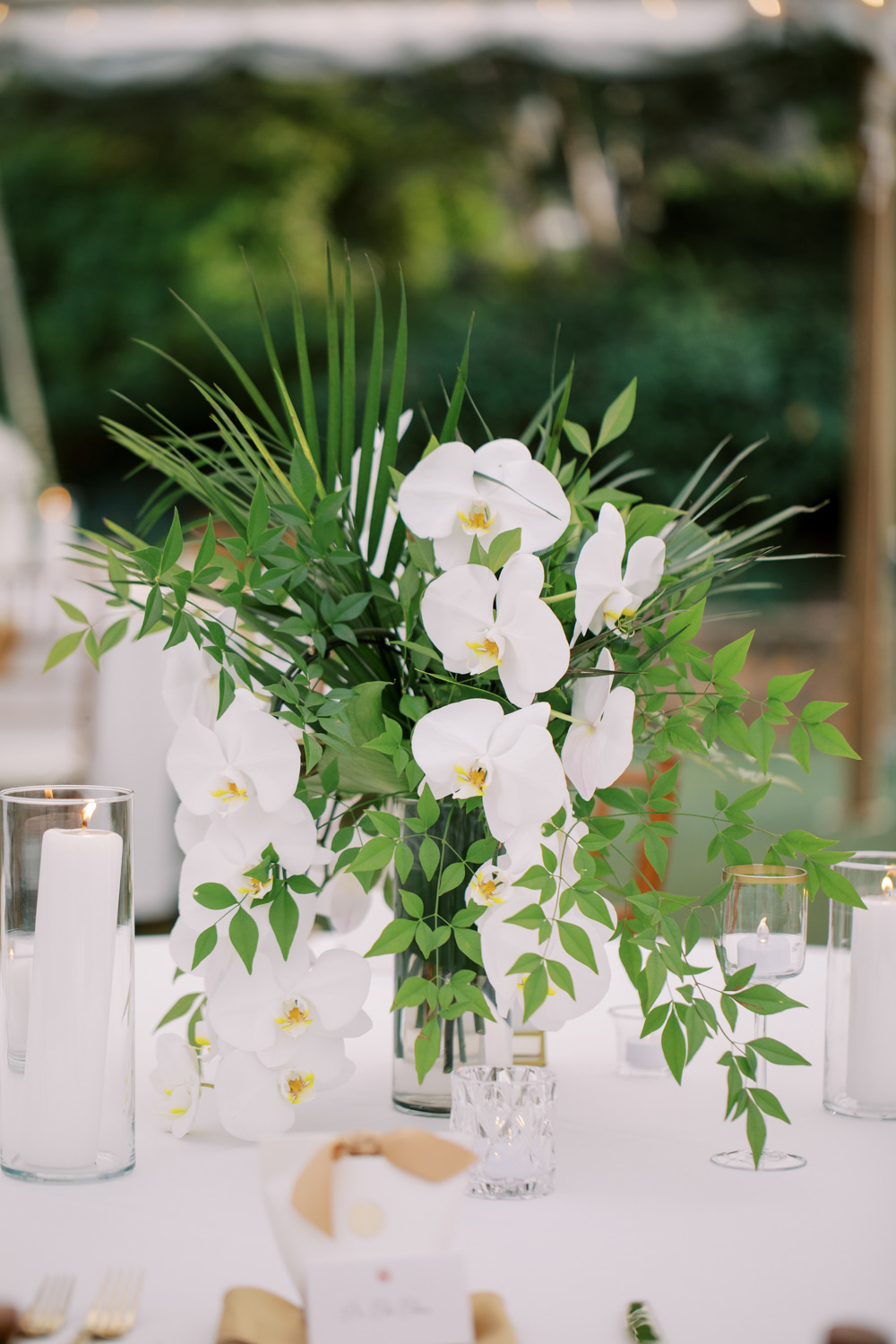 Keswick Vineyards Wedding The Smiths Photography Centrepiece Decor Orchid Cream Tall Flowers Round Table