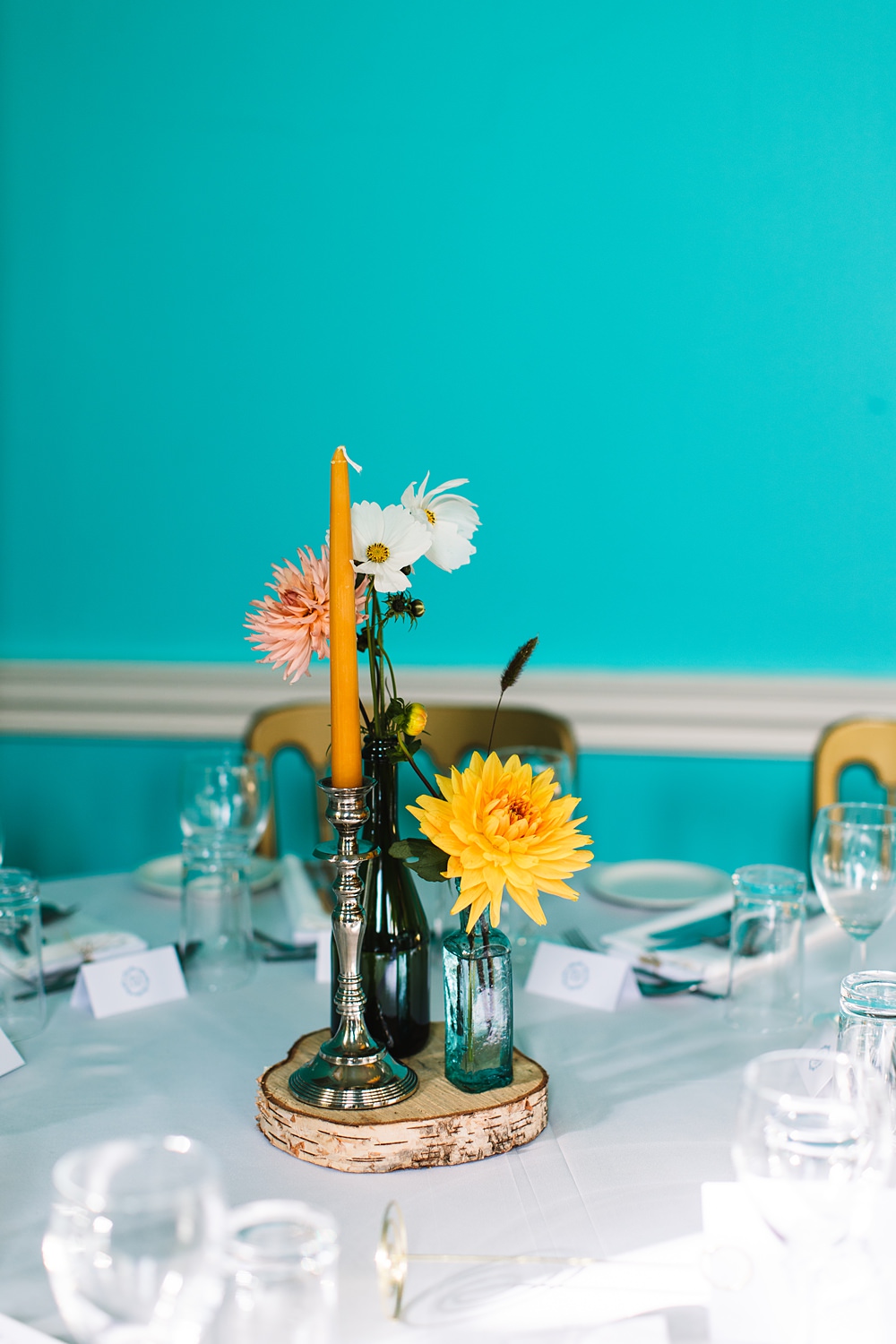 Shropshire Country House Wedding Kate Jackson Photography Centrepiece Log Slice Flowers Candles Colourful
