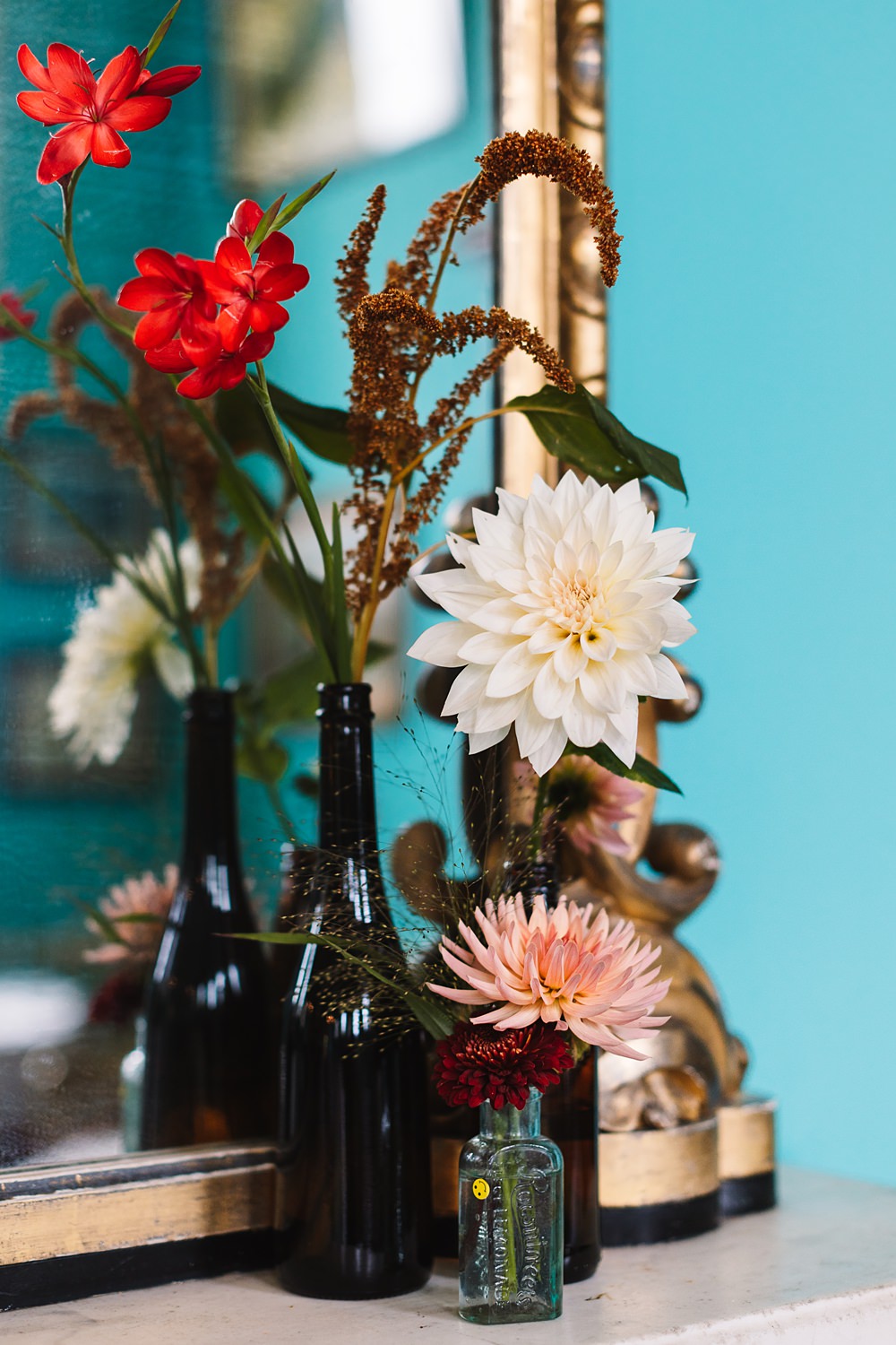 Shropshire Country House Wedding Kate Jackson Photography Bottle Flowers Mantlepiece