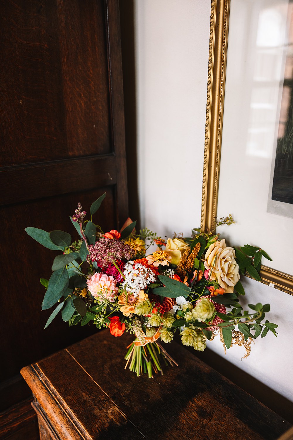 Shropshire Country House Wedding Kate Jackson Photography Bouquet Flowers Bride Red Yellow Greenery