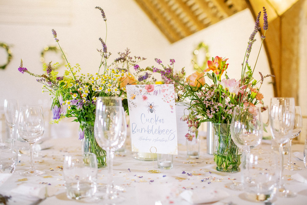 South Stoke Barn Wedding Gemma Vaughan Photography Barn Fairy Lights Circle Tables Flowers Centrepiece Table Name