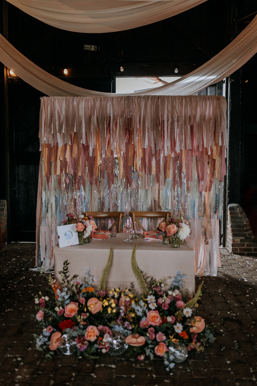 Elmley Nature Reserve Wedding Chris Blackledge Photography Streamer Top Table Backdrop Floor Flowers