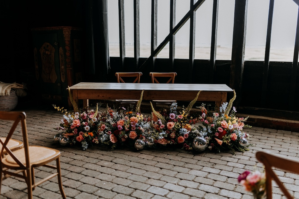 Elmley Nature Reserve Wedding Chris Blackledge Photography Floor Flowers Orange Ceremony Table