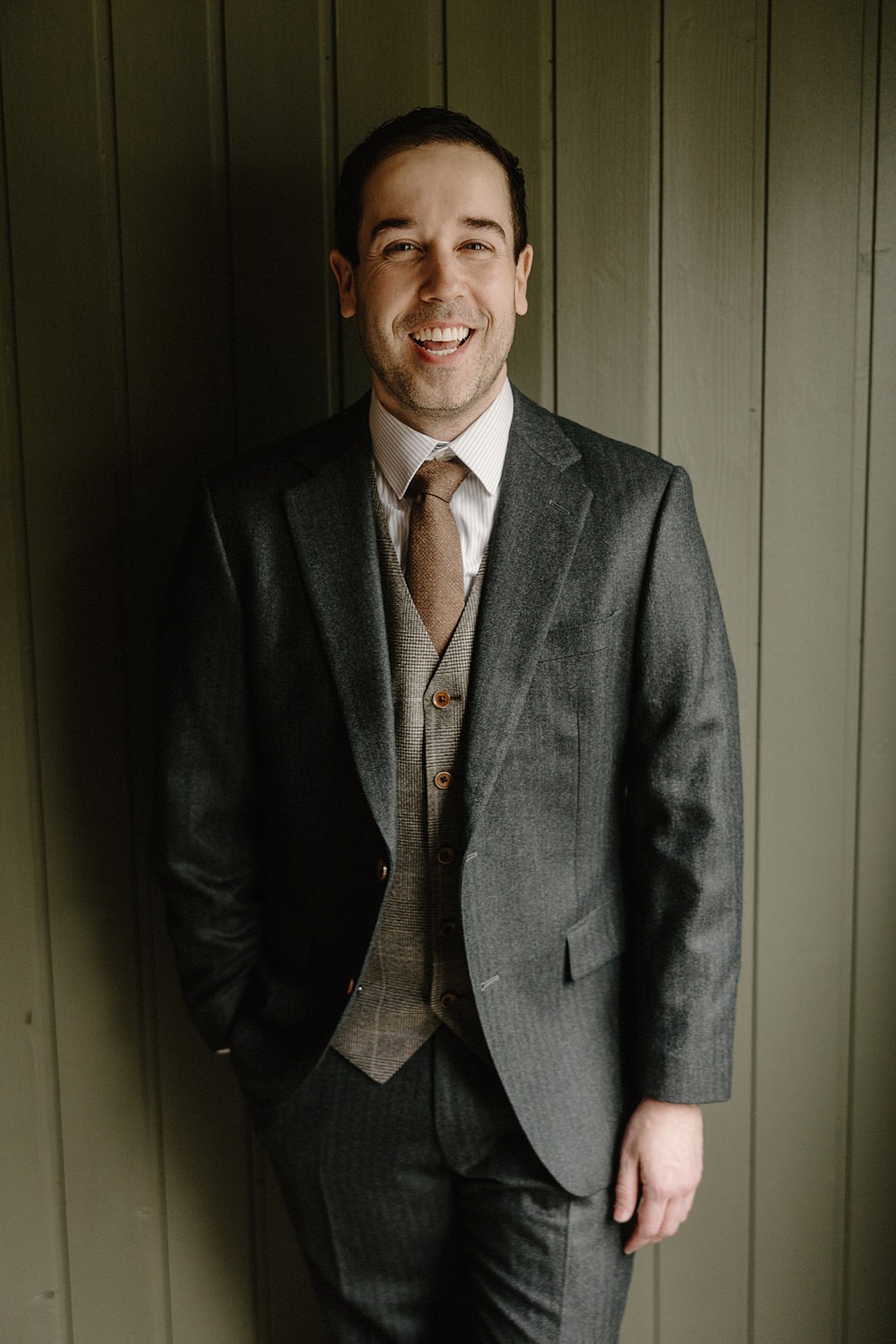 Hotel Katla Wedding ISKRA Photography Groom Tweed Suit Earthy Tan Tie Waistcoat