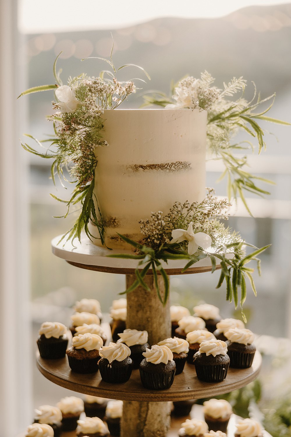 Hotel Katla Wedding ISKRA Photography Semi Naked Top Tier Cake Cupcake Tower