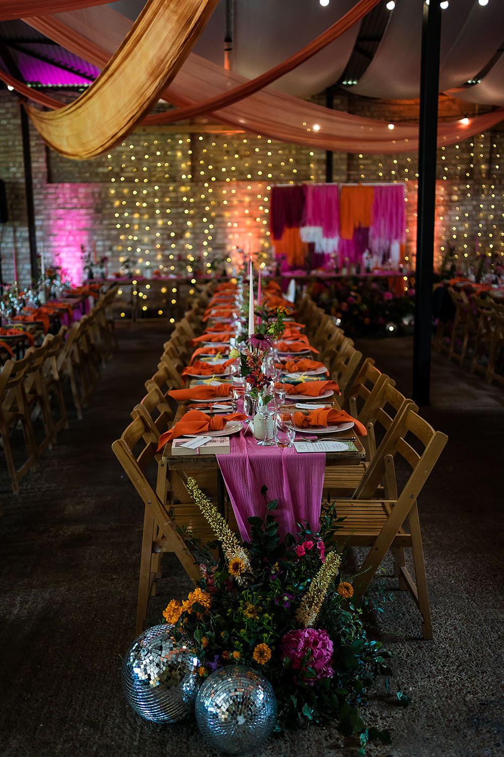 Pink Orange Disco Wedding Lisa and Neil Wedding Photography Long Table Decor Runner Flowers Disco Balls Candles