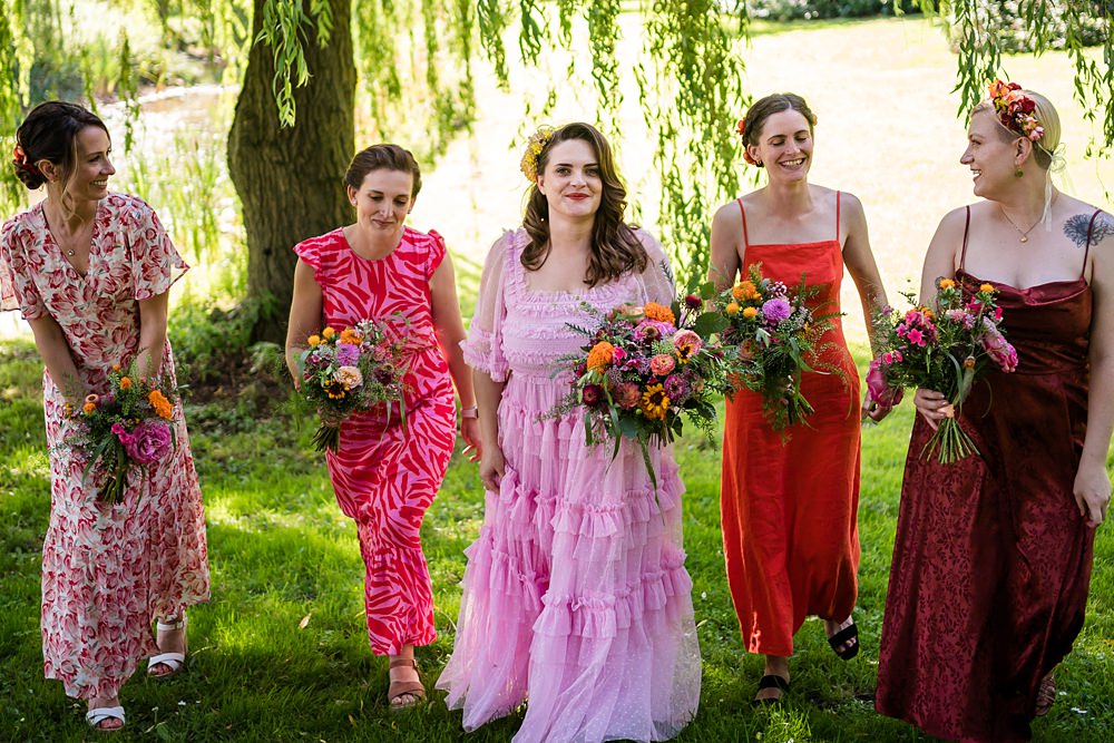 Pink Orange Disco Wedding Lisa and Neil Wedding Photography Mismatched Bridesmaid Dresses
