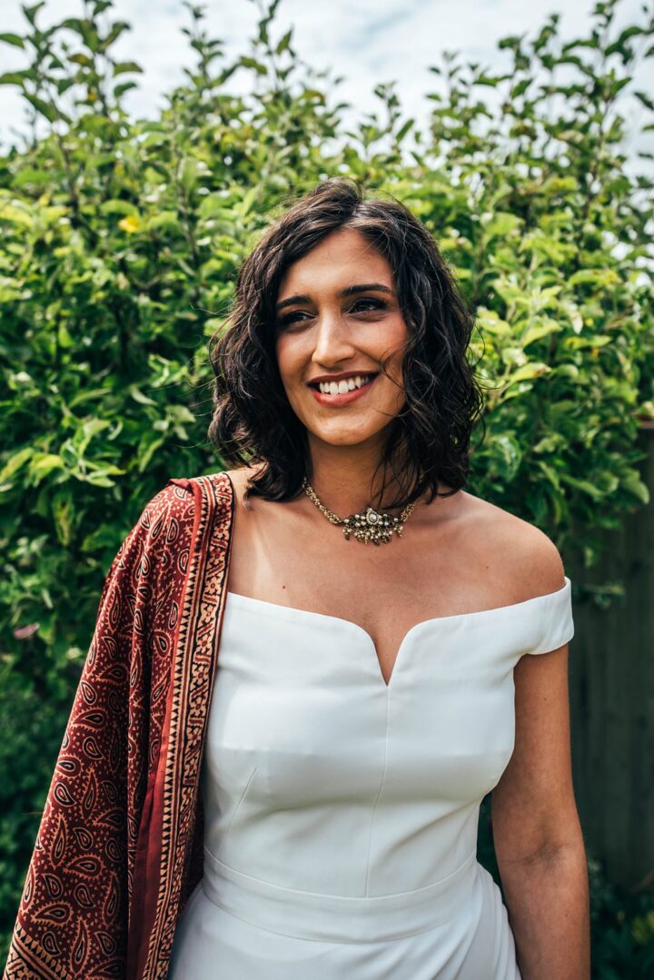 Short Bride Hairstyle Natural Tousled Waves Three Flowers Photography