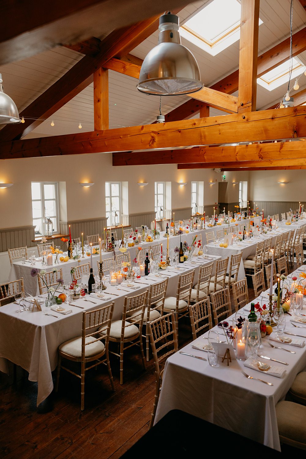 County Down Country House Wedding Iain Irwin Photography Barn Long Tables Decor Flowers Candles Fruit