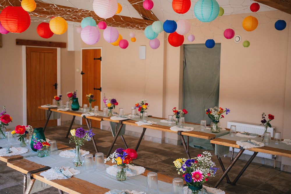 Goodlake Barns Wedding Becky Weir Photography Rainbow Colourful Lanterns Decor Long Tables Flowers