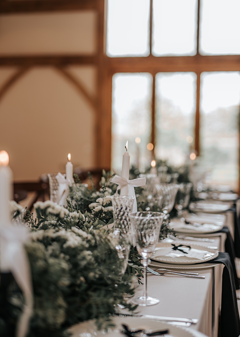 Chic Monochrome Wedding Inspiration Emma Collyer Photography Long Table White Runner Candles Greenery Centrepiece