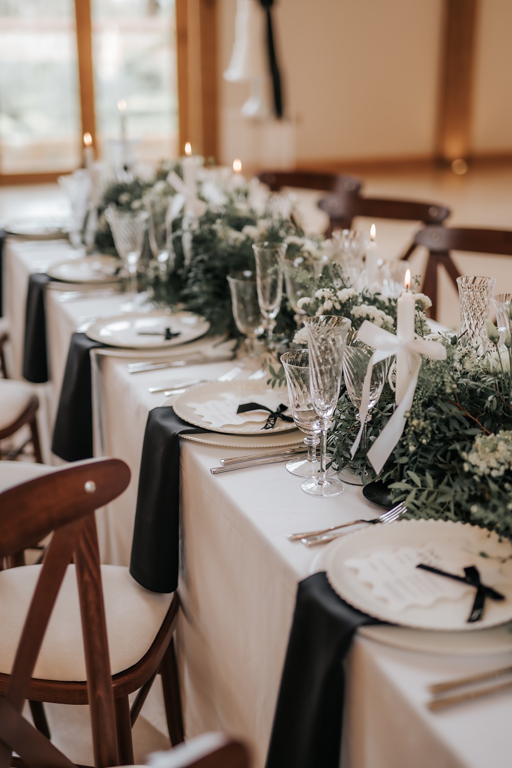 Chic Monochrome Wedding Inspiration Emma Collyer Photography Long Table White Runner Candles Greenery Centrepiece