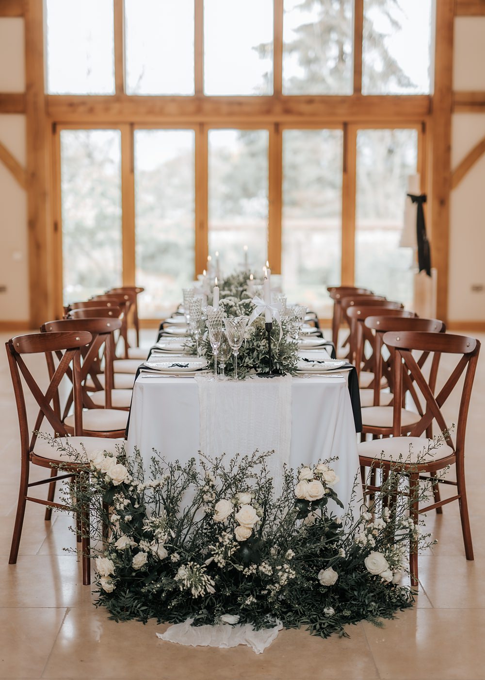 Chic Monochrome Wedding Inspiration Emma Collyer Photography Long Table White Runner Candles Greenery Centrepiece
