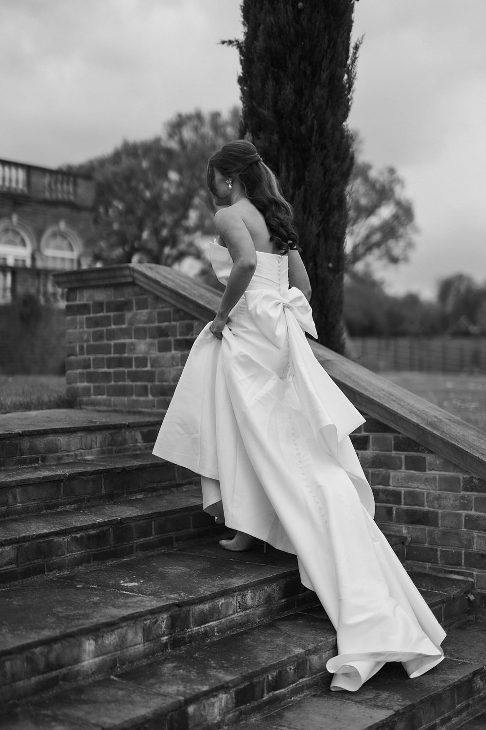 Chic Monochrome Wedding Inspiration Emma Collyer Photography Bridal Gown Bow Back Strapless Mermaid