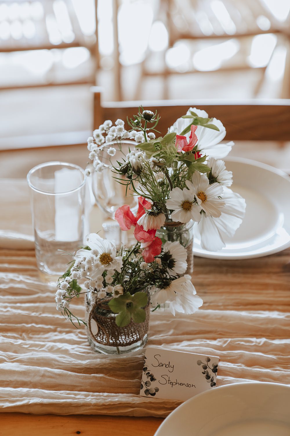 Church Tipi Wedding Charlotte Wotton Photography White Flowers Jars Centrepiece