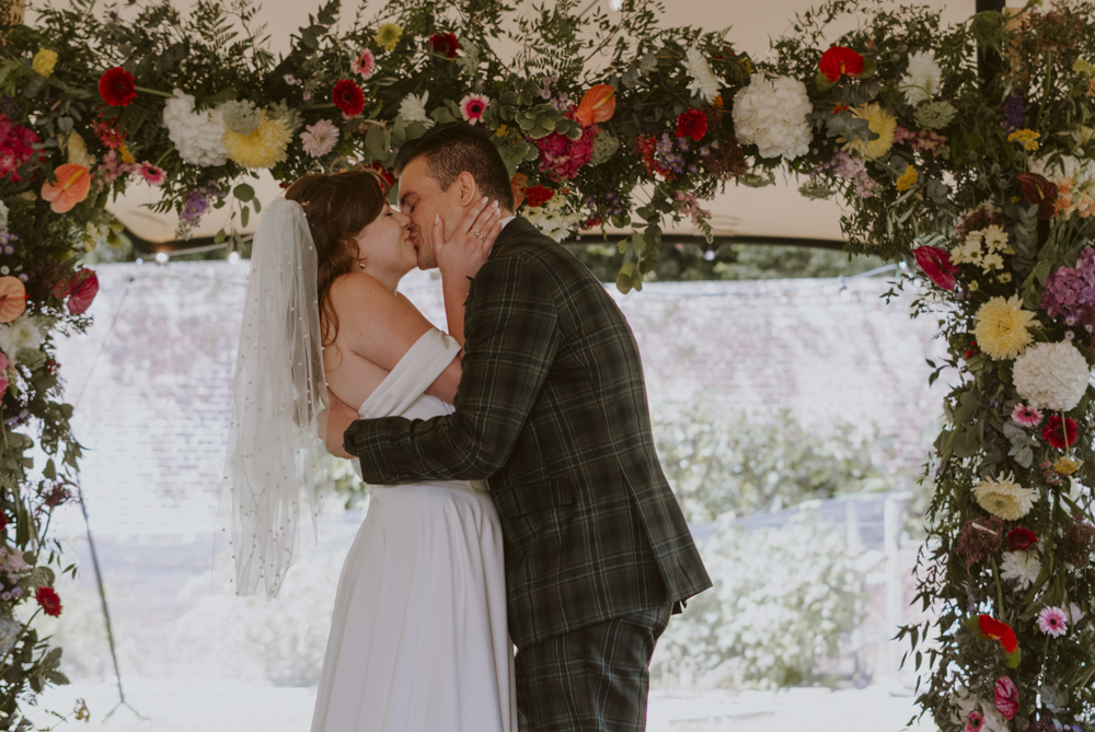 Highden Estate Wedding Sasha Weddings Colourful Flower Arch Ceremony