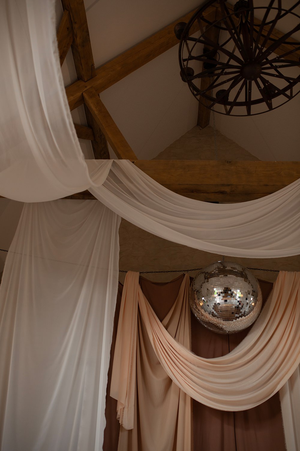 Roller Disco Wedding Ideas Heather Winstanley Photography Barn Drapes Disco Ball Backdrop