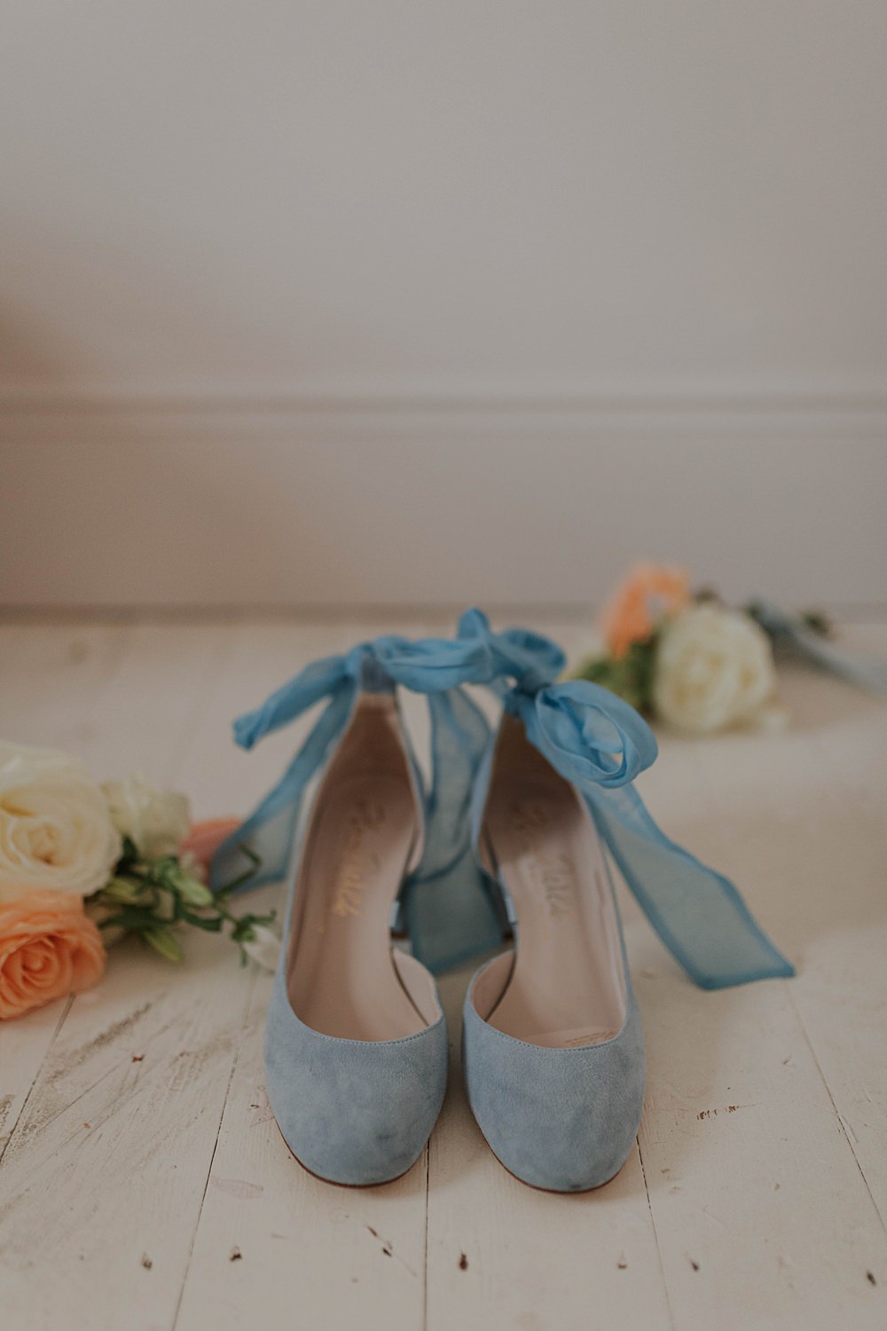 The Hackney Co Wedding Grace Pham Photography Bridal Shoes Blue Bow Ribbon