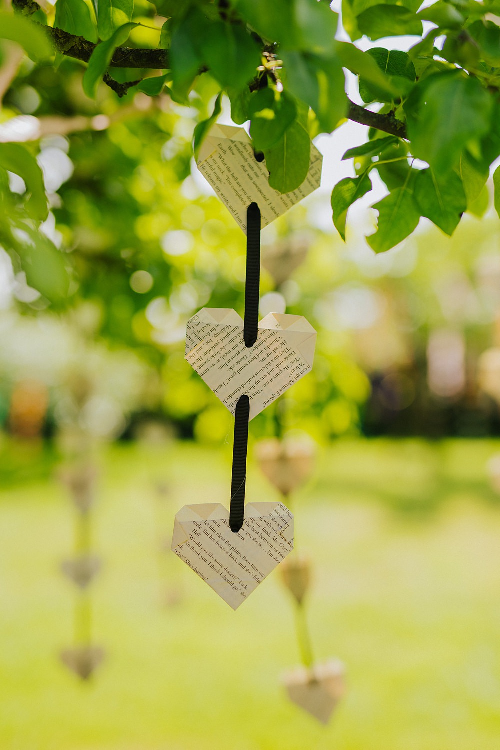 Colourful DIY Tipi Garden Wedding Lily North Photography Hanging Book Paper Hearts Decor