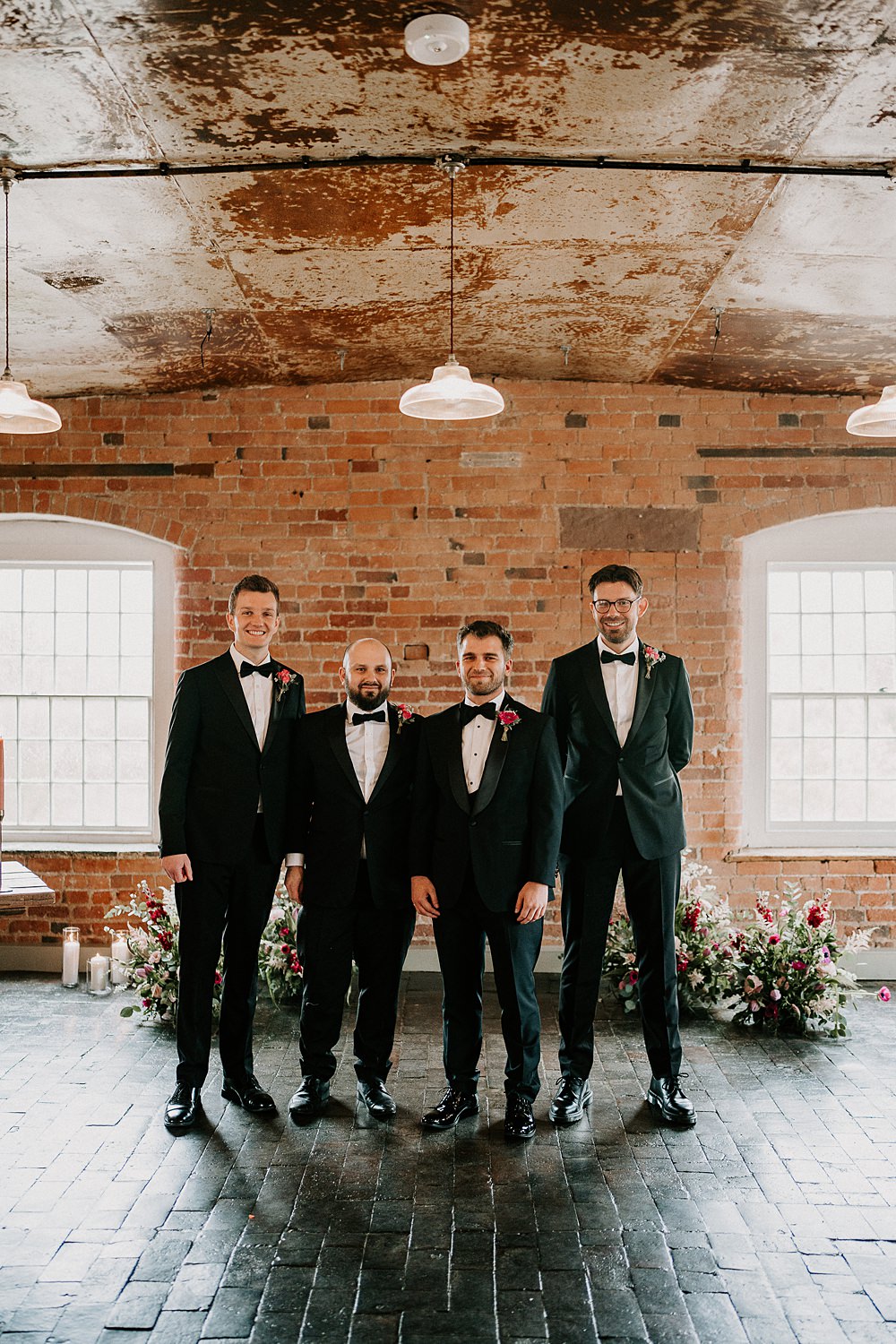 Industrial Spring Wedding Mirl & Co Groom Groomsmen Black Suit Tuxedos
