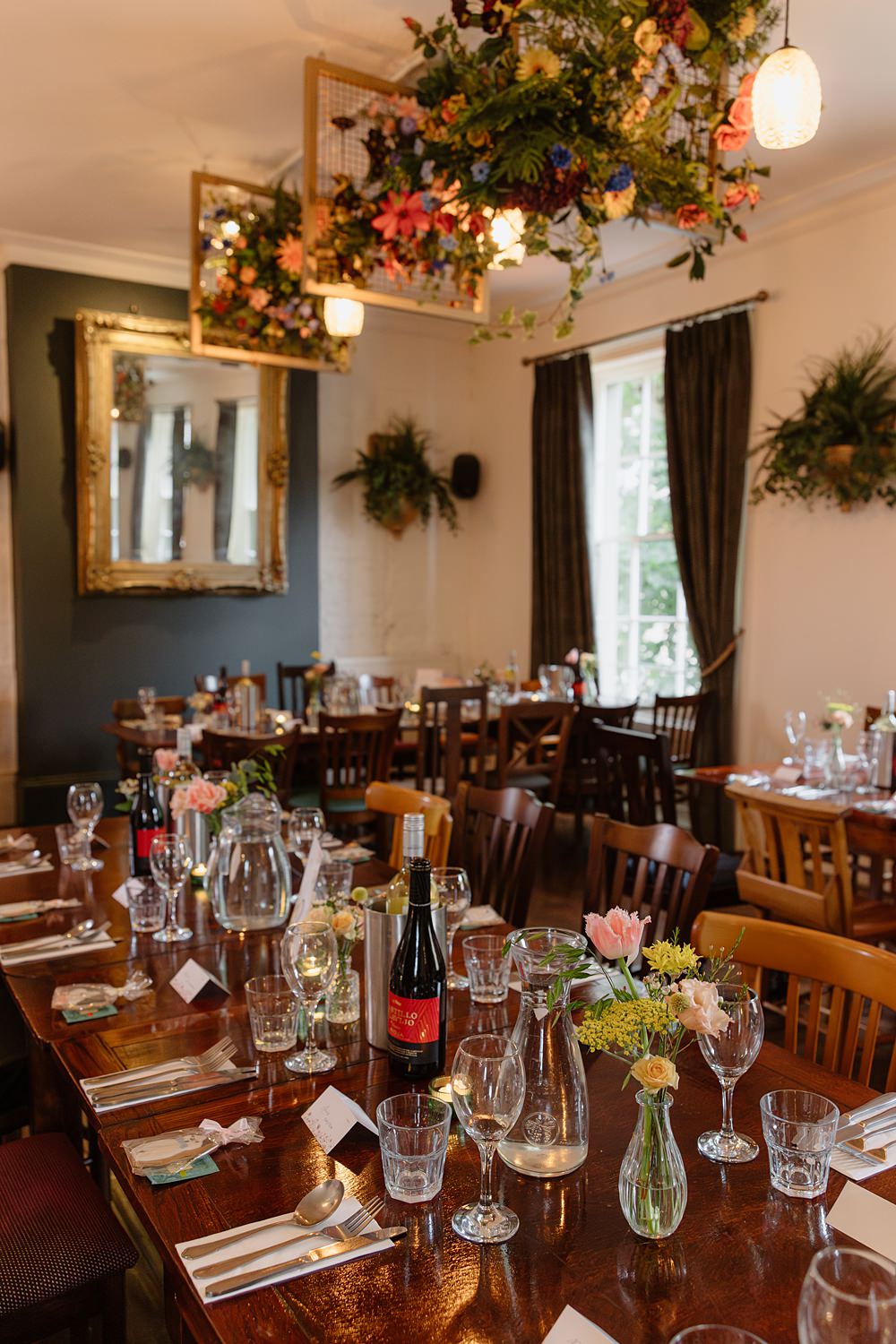 Prince Albert Camden Wedding Heather Sham Photography Wooden Tables Colourful Flowers Decor Tea Lights Ceiling Flowers