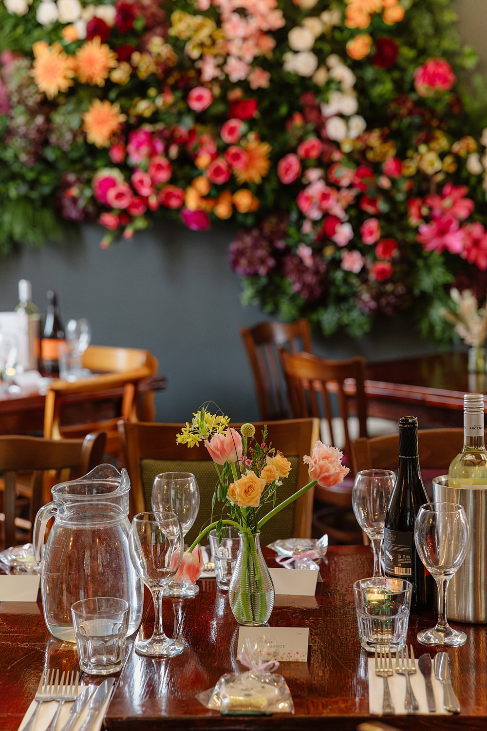 Prince Albert Camden Wedding Heather Sham Photography Wooden Tables Colourful Flowers Decor Tea Lights Flower Backdrop