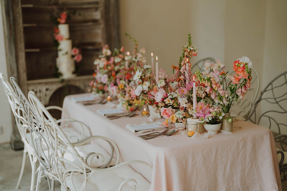 Spring Cotswolds Wedding Ideas Mei Lou Photography Pink Peach Flowers Centrepiece Table Candles